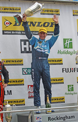 Jason Plato celebrates winning the first race of the day