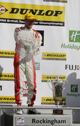 Gordon Shedden celebrates winning the 2nd race