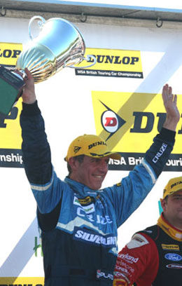 Jason Plato celebrates winning the first race from Brands Hatch