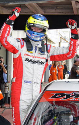 Gordon Shedden celebrates victory in the penultimate race