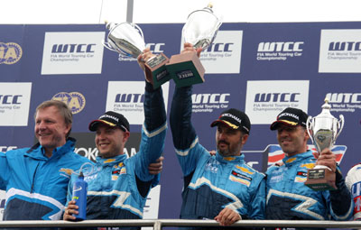 Muller, Huff and Menu celebrate their race 1 result