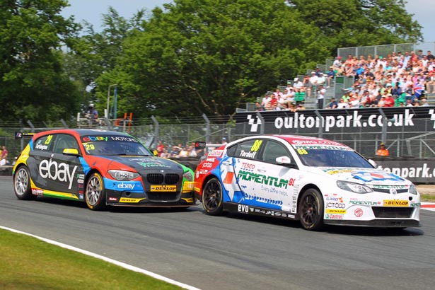 Colin Turkington doing battle with Sam Tordoff