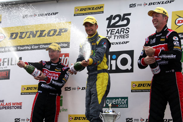 Colin Turkington celebrates with Matt Neal and Gordon Shedden