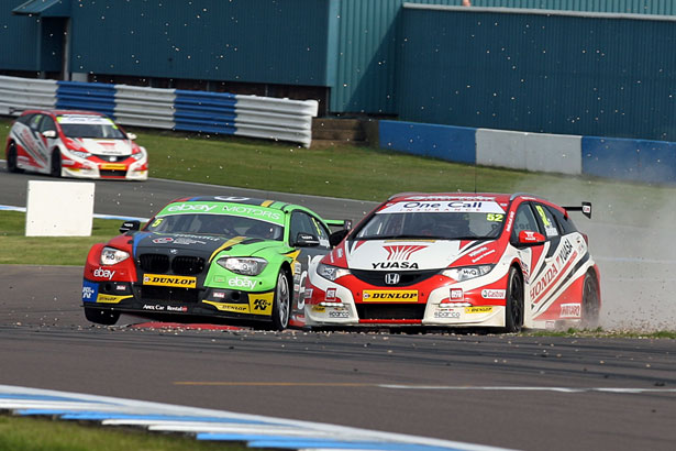 Gordon Shedden puts a last corner move on Colin Turkington