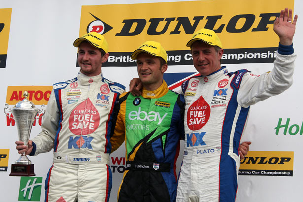 Colin Turkington celebrates with Sam Tordoff (left) and Jason Plato (right)