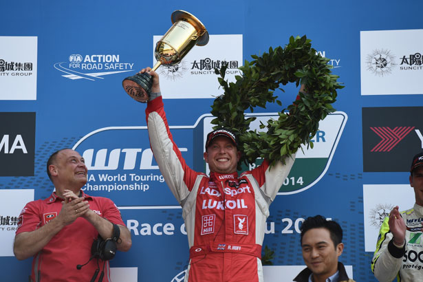 Rob Huff on the podium at Macau for his 7th win at the circuit